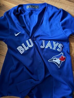 Blue Jay Royal Blue Team Button-Up Jersey with White Script and Red Maple Logo